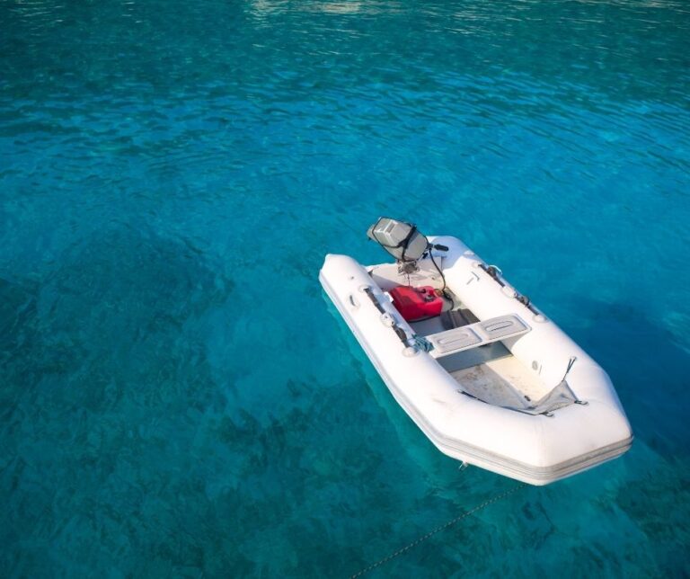 boat tender in clear blue water