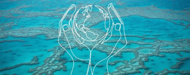 Hands holding the world with the great barrier reef in the background, symbolising being environmental